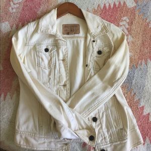 Off white distressed denim jacket